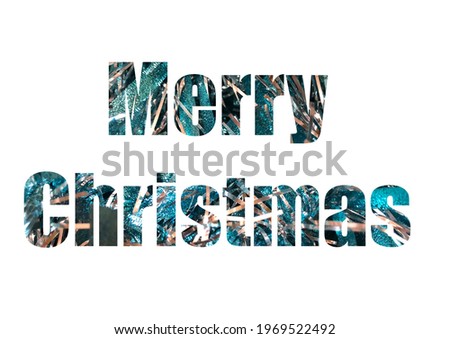 texture of blue tinsel on the entire screen. Shot through the cut-out silhouette of the word MERRY CHRISTMAS