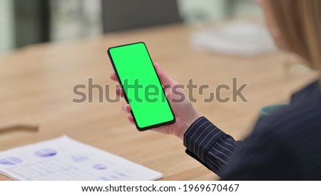 Businesswoman Watching Smartphone with Chroma Screen