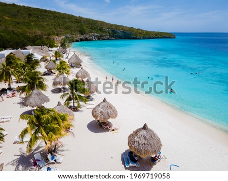 Cas Aboa Beach on the Caribbean island of Curacao, Playa Cas Abou in Curacao Caribbean tropical white beach with blue ocean Royalty-Free Stock Photo #1969719058