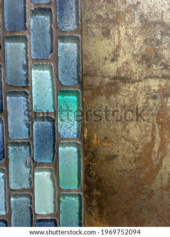 bright blue and blue glass mosaic and yellow metal