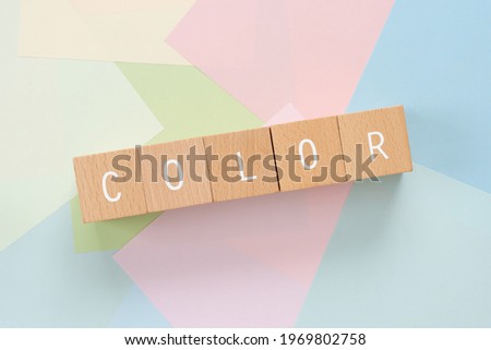 COLOR; Wooden blocks with "COLOR" text of concept.