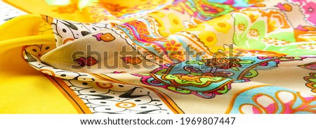 silk paisley fabric, ornate traditional elements of paisley indian theme with ethnic details in bohemian print, colorful texture, background, pattern
