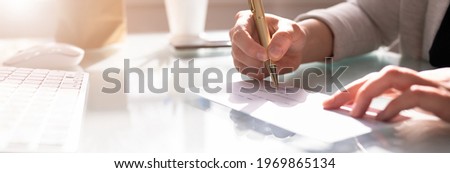 Insurance Paycheck. Payroll Check. Hand Writing Cheque Royalty-Free Stock Photo #1969865134