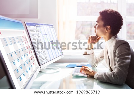 Business Woman Using Calendar Agenda Schedule On Computer Screen
