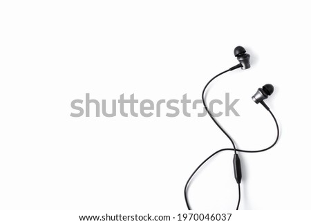 Black headphones on white isolated background. Space for text. Copy space. Flat lay. 