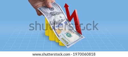 Successful money financial investment concept,100 Dollar bill lay on top of coins. Ideas for Investing with US stocks, funds, bonds or debenture with high return investments, US Inflation rates. Royalty-Free Stock Photo #1970060818