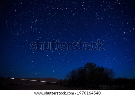 starry night at the countryside with  shooting stars