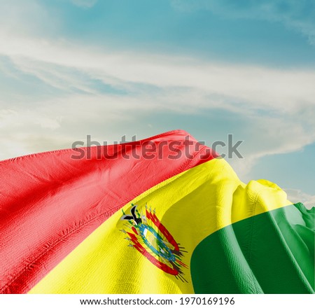 Bolivia waving flag in the sky.