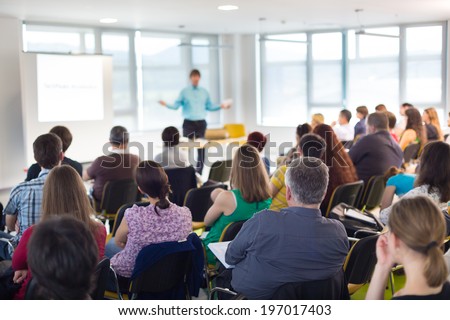 Speaker at Business convention and Presentation. Audience at the conference hall. Royalty-Free Stock Photo #197017403