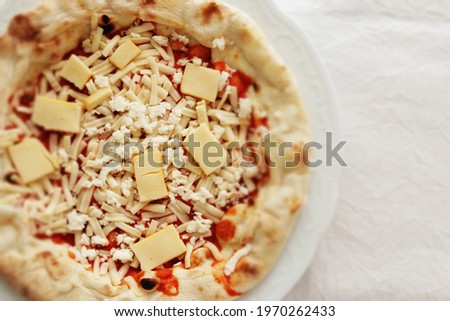 Frozen food, Italian cheese pizza on dish
