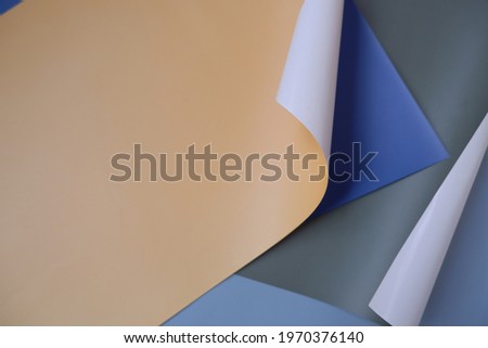 Layered rolling color papers. color layout for design, banner, and background.