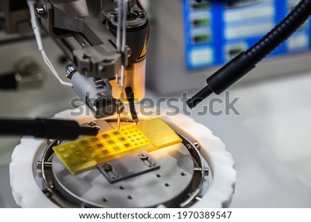 semi-automatic installation of ultrasonic micro-welding and assembly of components Royalty-Free Stock Photo #1970389547