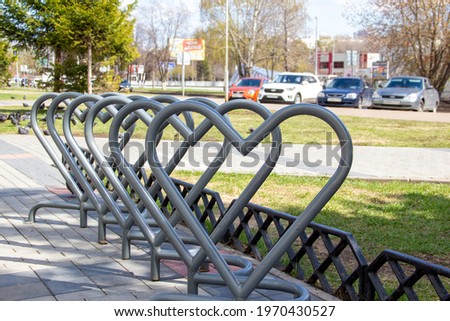 heart-shaped bike parking, bicycles sports, movement, life in an active rhythm