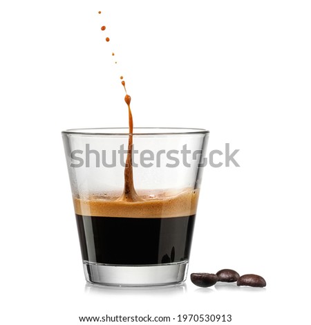 Espresso coffee glass with a drop up on white background Royalty-Free Stock Photo #1970530913