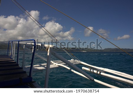 A picture of a part of a boat on the sea