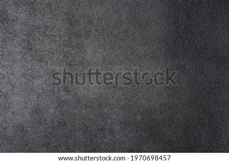 Gray leather surface background macro close up view. Pattern of cow skin