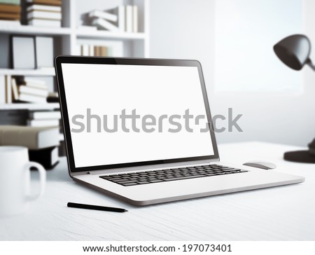 Laptop in white room Royalty-Free Stock Photo #197073401