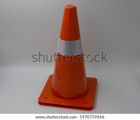 Close up photo of orange cone