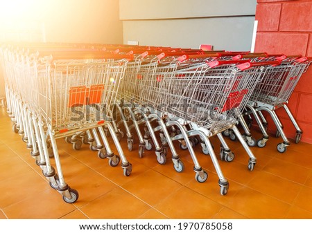 Consumerism concept. Empty trolley shop in the supermarket. 