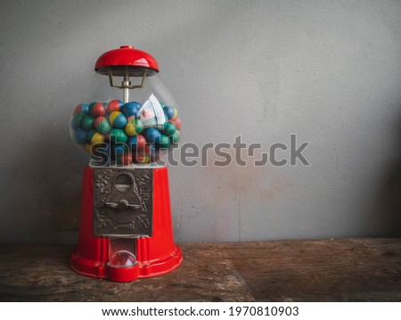 Background picture of a dozen children's toys, red spinning and multi-colored candy, retro items