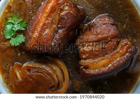 Stewed Pork Belly with Black Sauce. Royalty-Free Stock Photo #1970844020