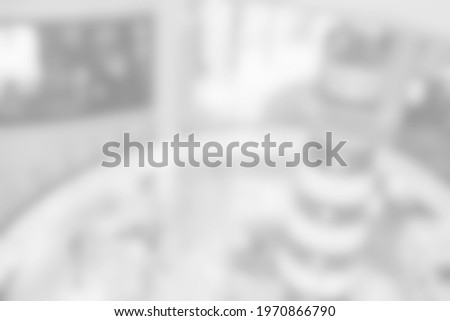 White Blurred Interior of Department Store Hallway Background.