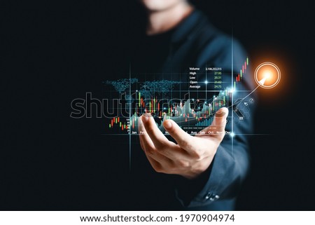 Businessman analyze sales data and graph economic growth. Planning and business strategy Analysis of forex trading Finance and banking. Digital marketing technology. Royalty-Free Stock Photo #1970904974