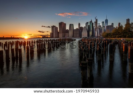 New York Skyline seen from Brooklyn Park at sunset