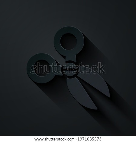 Paper cut Scissors icon isolated on black background. Cutting tool sign. Paper art style. Vector