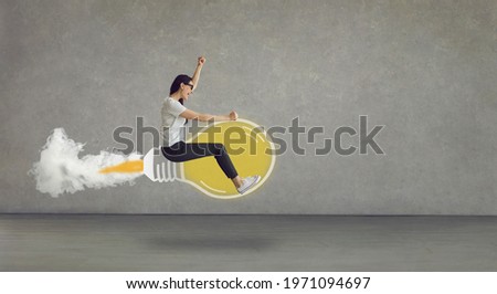 Make dream come true. Side view confident hipster girl with drive to succeed riding yellow cartoon doodle idea light bulb rocket. Modern business header, year 2021 ultimate gray and illuminating color Royalty-Free Stock Photo #1971094697