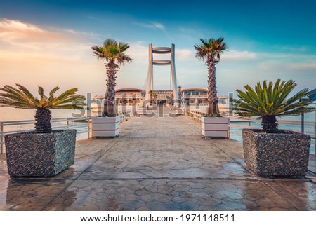 Nice sunrise in Durres, port city on the Adriatic Sea in western Albania, Europe. Picturesque Adriatic seascape. Calm spring scene of Albania. Traveling concept background.
