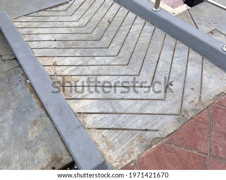 Arrow sign sidewalk floor texture pattern background 
