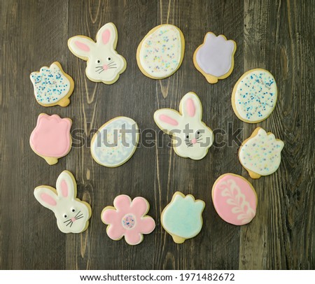 Easter sugar cookies with pastel color royal icing in different shapes.