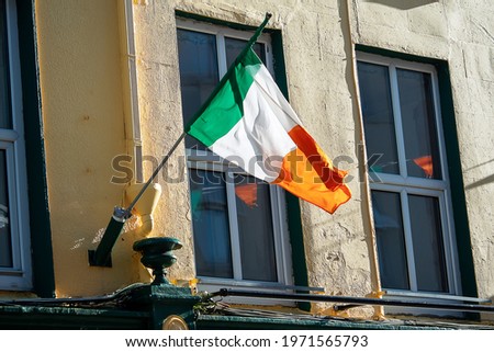 Republic of Ireland National flag in a street. Street decorated for special event