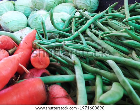 Close up of three healthy beans, carrots and cabbage vegetables - Stock photo