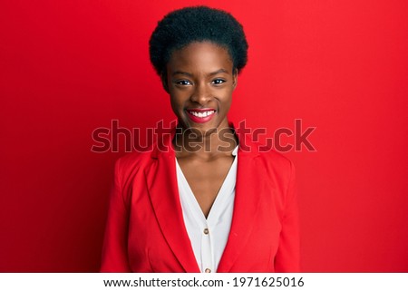 Young african american girl wearing business clothes with a happy and cool smile on face. lucky person. 