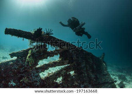 technical scuba diver hovers over a wreck Royalty-Free Stock Photo #197163668