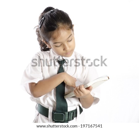 Cute School Girl  Reading a Book