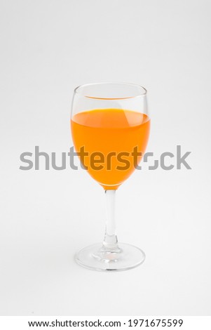 Orange juice glass, isolated on white background
