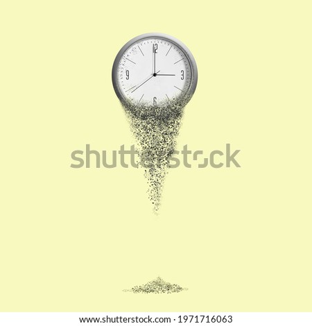 Clock falls apart, on a yellow background. Dispersion effect. The concept of the passing time. Business. Lifestyle. Background.