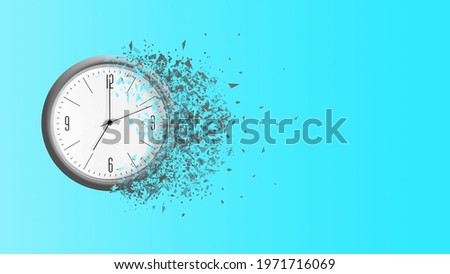 Clock falls apart, on a blue background. Dispersion effect. Copy space. Concept of the passing time. Business. Lifestyle. Background.