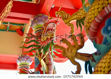 A dragon statue in a Chinese traditional art shrine