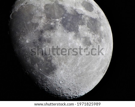 Large moon surface with craters, closeup night sky through telescope, lunar space background