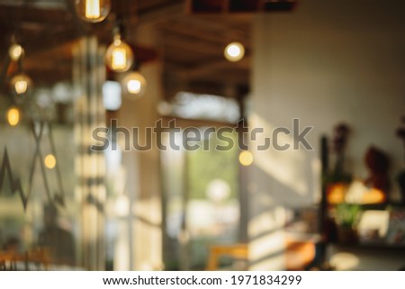 Abstract bokeh of soft light in restaurant with bokeh background. for texture.