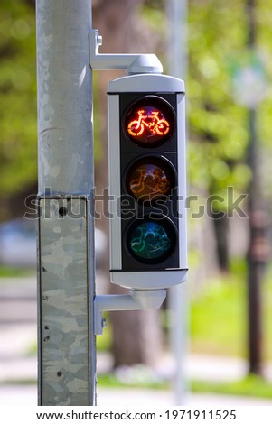 Bicycle traffic lights for cycle lane with red light illuminated signalling stop. Dublin, Ireland