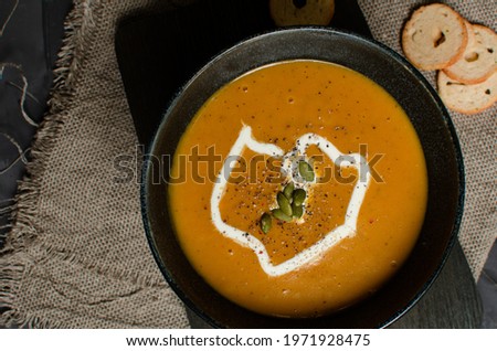 Pumpkin soup whit milky cream