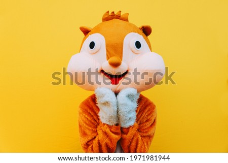 Squirrel character mascot has a message for humanity. Environmental concept about animal rights Royalty-Free Stock Photo #1971981944