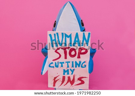 Character shark has a message for humanity about stop shark fishing and finning