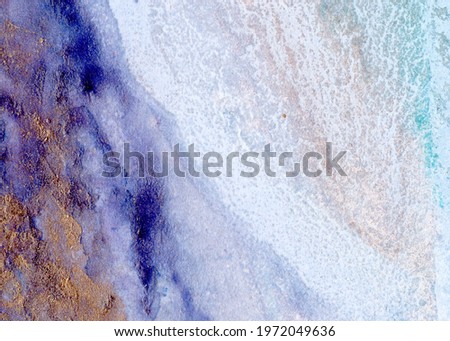 Abstract colorful art with gold — pink with violet and blue background, beautiful smudges, stains and brush strokes made with alcohol ink. Volumetric fluid art texture resembles oil painting on canvas