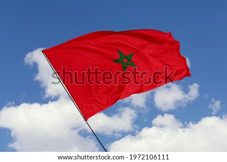 Morocco flag isolated on sky background with clipping path. close up waving flag of Morocco. flag symbols of Morocco.